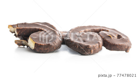 Sweet pastry palmeritas with chocolate icing. Sweet pastry palmeritas with chocolate icing. 77478021