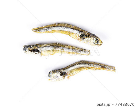 dried japanese anchovies on a white background dried japanese anchovies on a white background 77483670