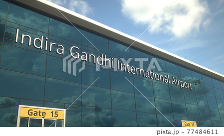 Airliner take off reflecting in the windows with Indira Gandhi International Airport text, 3d rendering 77484611
