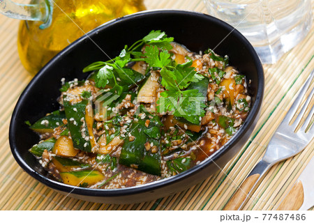 Broken cucumbers with sesame 77487486