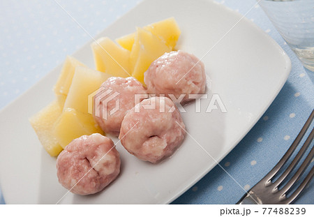 Steamed meatballs with potatoes 77488239