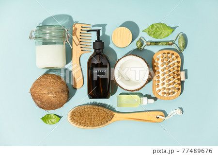 Spa coconut products flat lay, face, body and hair organic treatment concept Spa coconut products flat lay, face, body and hair organic treatment concept 77489676