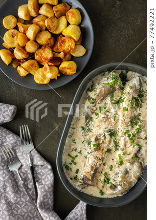 Stewed hake in a creamy sauce Stewed hake in a creamy sauce 77492221