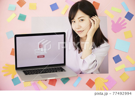 Woman with laptop. Forgot password Woman with laptop. Forgot password 77492994