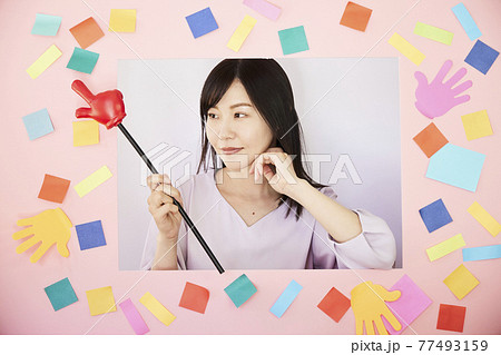 Woman with pink board Woman with pink board 77493159