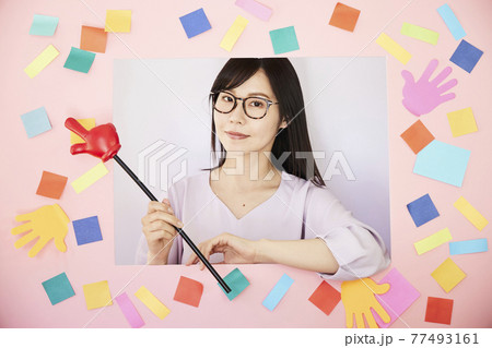 Woman with pink board Woman with pink board 77493161
