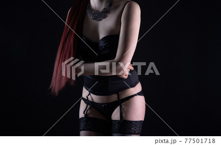 Image of the young woman in silk lingerie with long hair 77501718
