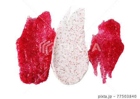 Textured smears of cosmetic products. Exfoliating Scrub with coffee particles and berry scrub with sugar, isolate on white Textured smears of cosmetic products. Exfoliating Scrub with coffee particles and berry scrub with sugar, isolate on white 77503840