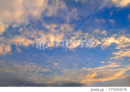 Beautiful morning. Blue sky and golden clouds. Beautiful morning. Blue sky and golden clouds. 77505079