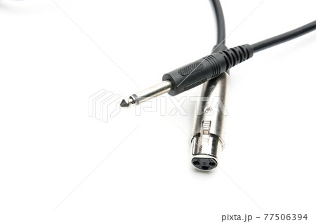 Audio cable with XLR and TRS jack connectors for microphones and professional audio equipment on a white background Audio cable with XLR and TRS jack connectors for microphones and professional audio equipment on a white background 77506394