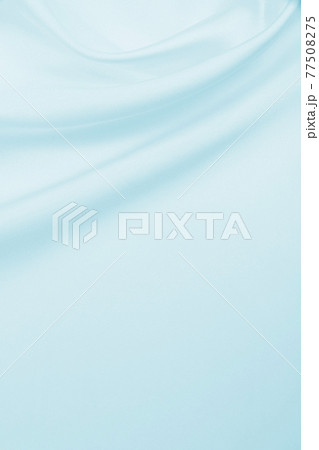 Smooth elegant blue silk or satin luxury cloth texture as abstract background. Luxurious background design Smooth elegant blue silk or satin luxury cloth texture as abstract background. Luxurious background design 77508275