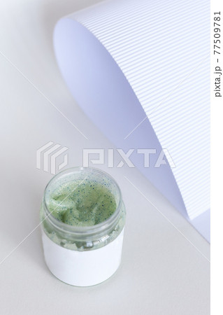 Body scrub of honey sugar peeling. Neutral Background. Body scrub of honey sugar peeling. Neutral Background. 77509781
