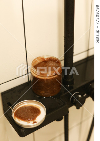 Body scrub of honey sugar peeling. Neutral Background. Body scrub of honey sugar peeling. Neutral Background. 77509799