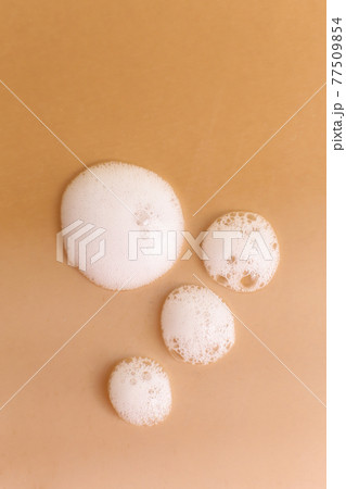 Cosmetic cleaning foam texture on neutral background 77509854