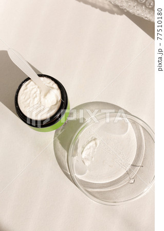 Cosmetic cream texture on neutral background 77510180