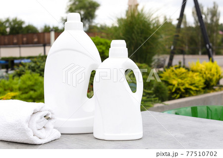 Softener bottle plastic bottle with liquid laundry detergent, cleaning agent, bleach or fabric softener Softener bottle plastic bottle with liquid laundry detergent, cleaning agent, bleach or fabric softener 77510702