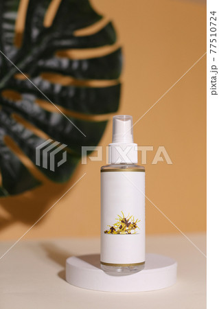 Eco friendly Bottle or jar with natural skincare cosmetics, creams or oils on light background. Plant-based beauty products 77510724