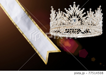 Prize Winning Award for Winner of Miss Beauty Queen Pageant Contest is Vehicle, Money, House, Diamond Crown, studio lighting abstract Blue background 77514508