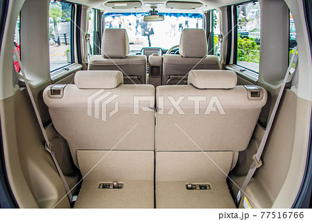 ハイトールワゴン型の軽自動車の荷室と後部座席の写真素材