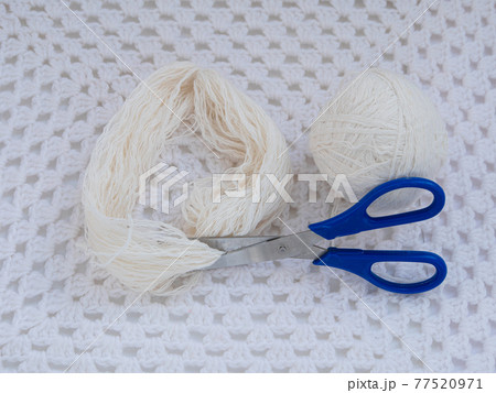 Scandinavian gnome with long beard red hat white knit background step by step handmade tutorial. Homemade DIY Scandinavian gnome with long beard red hat white knit background step by step handmade tutorial. Homemade DIY 77520971