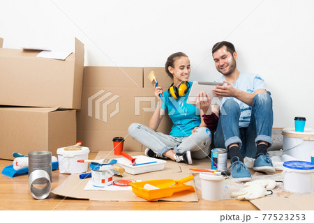 Couple watching something funny on tablet computer 77523253