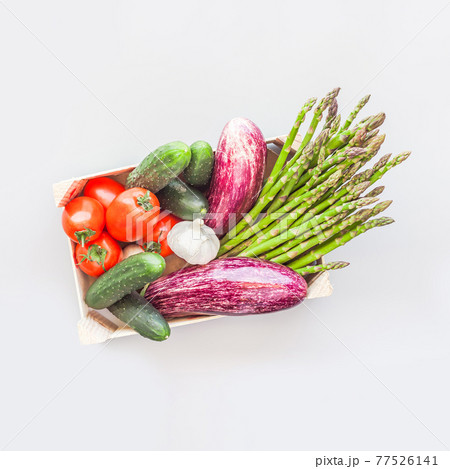 Fresh organic vegetables in wooden box Fresh organic vegetables in wooden box 77526141