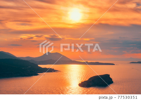 Aegean Sea with islands view on sunset 77530351