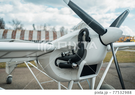 close up of engine and propeller of remote radio controlled light airplane close up of engine and propeller of remote radio controlled light airplane 77532988