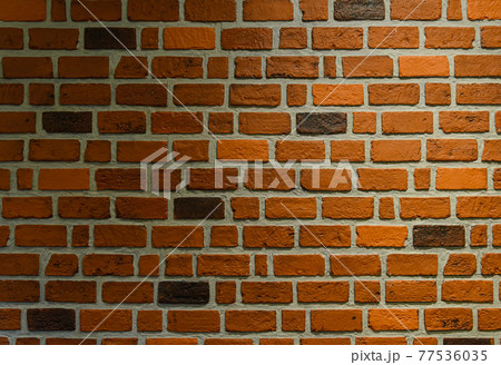 Orange colour bricks wall. Pattern. background Orange colour bricks wall. Pattern. background 77536035