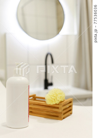 White Plastic dispenser bottles with body cream White Plastic dispenser bottles with body cream 77536036