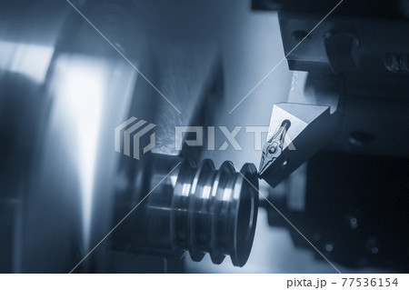 The CNC lathe machine groove cutting . The CNC lathe machine groove cutting . 77536154