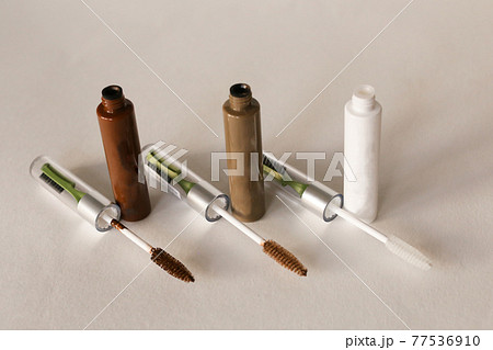 Isolated mascara on neutral backfround. Open with brush, black 77536910