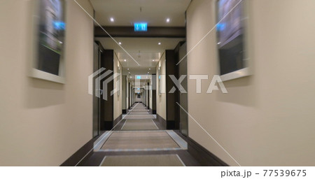 Timelapse of moving along the light hotel hall 77539675