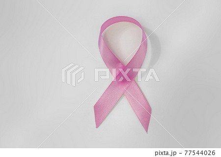 Pink Ribbon with a white background. Breast cancer concept. Pink Ribbon with a white background. Breast cancer concept. 77544026