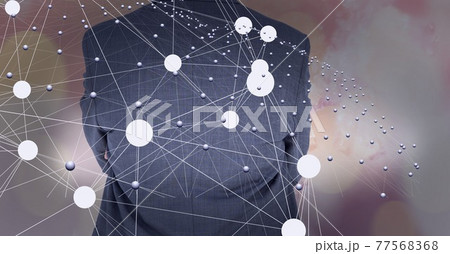 Network of connections with a businessman's back in the background, networking concept 77568368