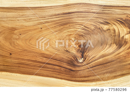 Texture of live edge suar wood slab with knot closeup Texture of live edge suar wood slab with knot closeup 77580296