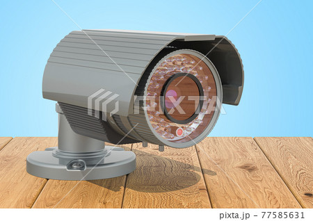 Security surveillance camera on the wooden planks, 3D rendering Security surveillance camera on the wooden planks, 3D rendering 77585631