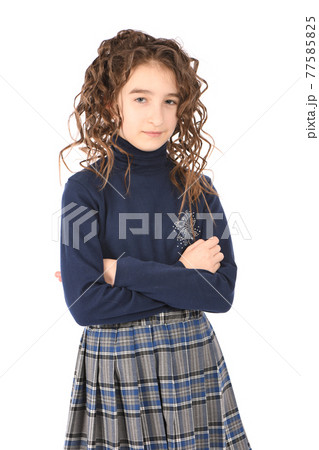 Portrait of adorable smiling girl child schoolgirl with curl hair 77585825