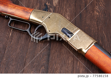 Old west gun - lever-action repeating rifle Old west gun - lever-action repeating rifle 77586158