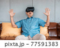 asian senior man enjoying when wearing VR headsets(vintage tone) 77591383
