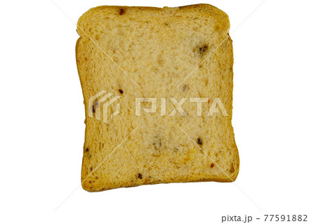 Slice of olive bread with spices isolated on white background Slice of olive bread with spices isolated on white background 77591882