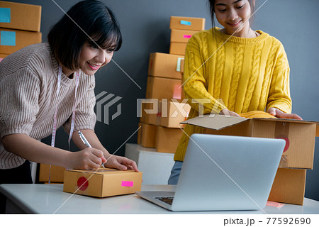 Young asian girl is freelancer with her private business at home office Young asian girl is freelancer with her private business at home office 77592690