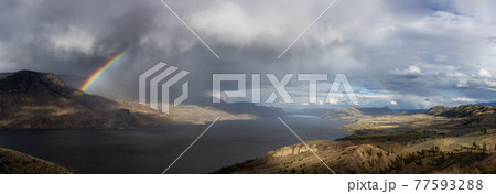 Panoramic View of Canadian Mountain Landscape in Desert by the Lake 77593288