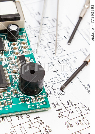 Circuit board with transistors, resistors, capacitor. Diagram of electronics and precision tools 77593293