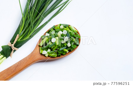 Spring onion on white background. Spring onion on white background. 77596251