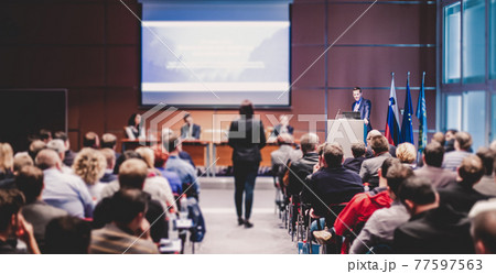 Speaker giving presentation on scientific business conference. 77597563