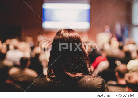 Audience at the conference hall. 77597564