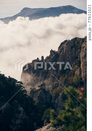 Grand stone pillars on the slopes of Mount Demerdzhi. Valley of ghosts, Crimean Mountains. 77611021