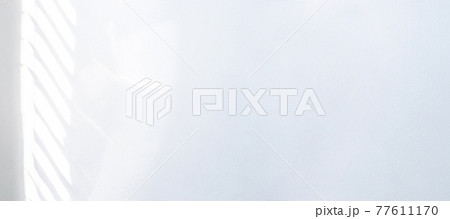 Shadow floor. Abstract light, black shadow overlay from window on white texture wall. Sunlight architecture background. Overlay effect for photo and design. 77611170