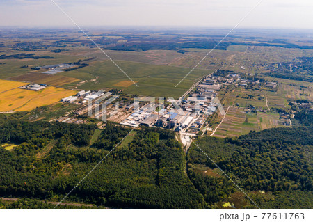 Forest and village in Ukraine, flight over the village of Klevan, view of the love tunnel from above. Forest and village in Ukraine, flight over the village of Klevan, view of the love tunnel from above. 77611763